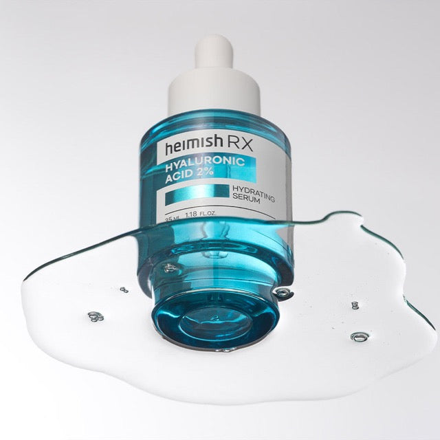 ProtoClinical k-beauty heimish RX Hyaluronic Acid 2% Hydrating Serum 35ml single upright teal serum bottle centered on a light background with soft aqua and peach side accents.