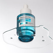 ProtoClinical k-beauty heimish RX Hyaluronic Acid 2% Hydrating Serum 35ml single upright teal serum bottle centered on a light background with soft aqua and peach side accents.