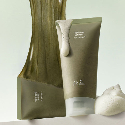 ProtoClinical k-beauty beauty product packaging with a dark olive vertical center on a light background.