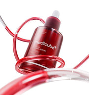 ProtoClinical k-beauty deep burgundy beauty product silhouette with pale aqua side accents on a light background.