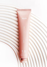 ProtoClinical k-beauty Abib PDRN Intensive Cream 1.5 Tube 75ml single upright cream tube centered on a soft gray and blush pink split background