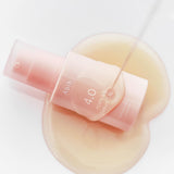 ProtoClinical k-beauty Abib PDRN Glow Serum 4.0 Pump 30ml single upright beige pump bottle centered on a white background with pale blue and peach side shading