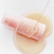 ProtoClinical k-beauty Abib PDRN Glow Serum 4.0 Pump 30ml single upright beige pump bottle centered on a white background with pale blue and peach side shading