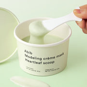 ProtoClinical k-beauty Abib Modeling Creme Mask Heartleaf Scoop 71g square creme mask package with a muted sage center panel and soft beige side blocks on a light background