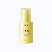 ProtoClinical k-beauty Abib Bright Force Serum 13.0 Pump 30ml single pale yellow pump bottle centered vertically on a soft white background