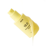 ProtoClinical k-beauty Abib Bright Force Serum 13.0 Pump 30ml single pale yellow pump bottle shown diagonally on a pale blue and white background