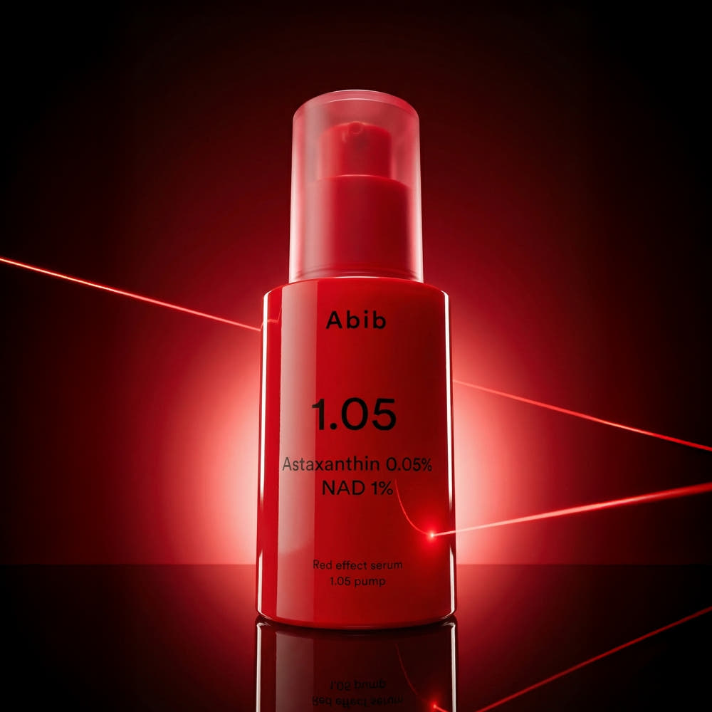 ProtoClinical k-beauty Abib Red Effect Serum 1.05 Pump 30ml single deep pink pump bottle centered on a black background with soft red reflections
