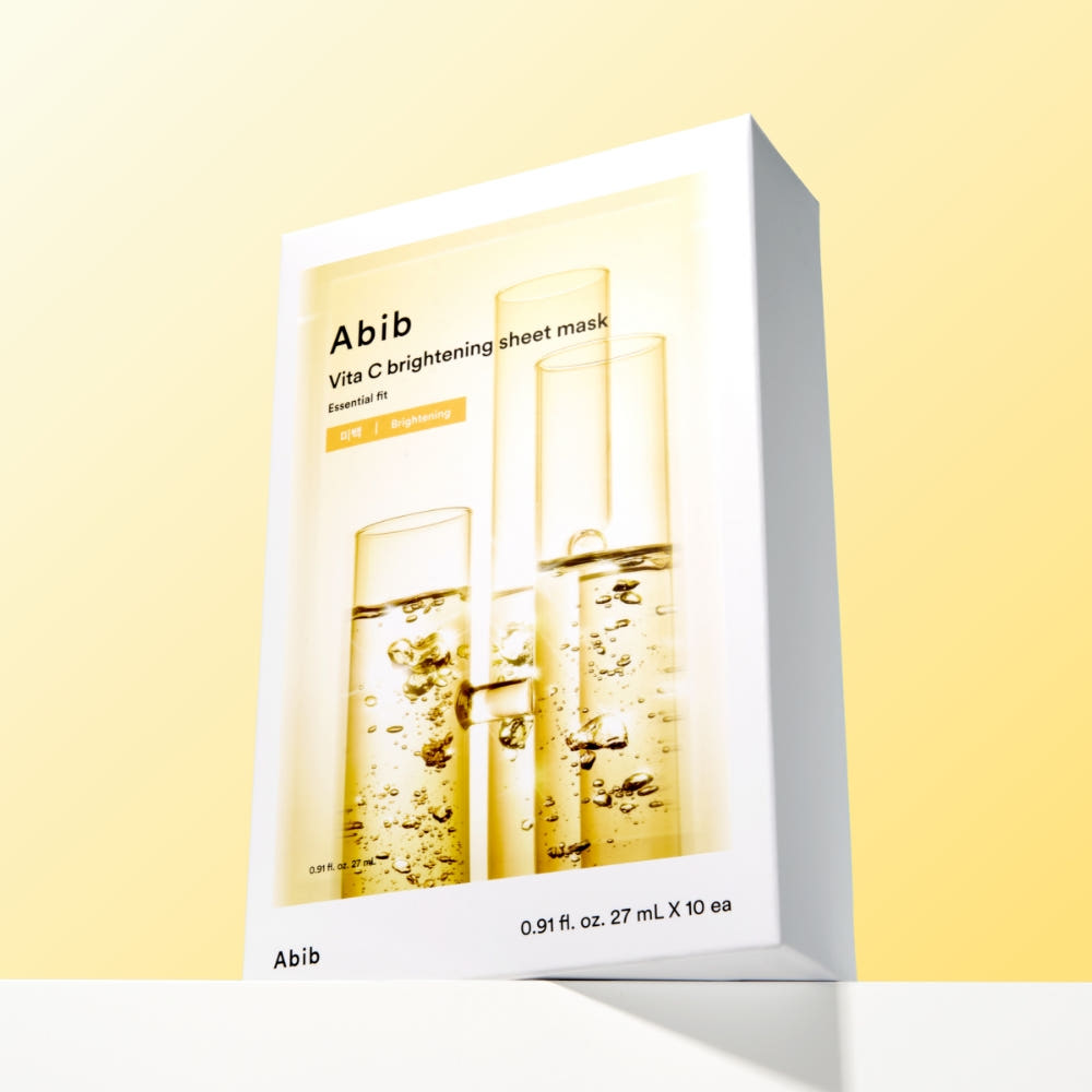 ProtoClinical k-beauty Abib Vita C Brightening Sheet Mask Essential Fit 27ml X 10ea single rectangular sheet mask packet with a dark lower section on a pale yellow background
