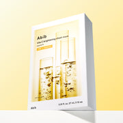 ProtoClinical k-beauty Abib Vita C Brightening Sheet Mask Essential Fit 27ml X 10ea single rectangular sheet mask packet with a dark lower section on a pale yellow background