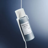 ProtoClinical k-beauty SKIN1004 Hyalu-Teca Glass Skin Milk 210ml abstract product graphic with blue-gray diagonal bands fading into a bright white gradient
