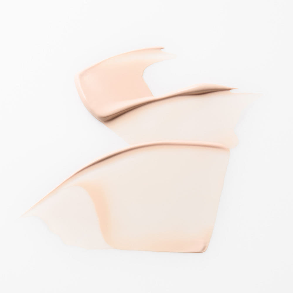 ProtoClinical k-beauty soft peach beauty graphic with pale blue side shading on a light background.