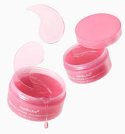 ProtoClinical k-beauty medicube PDRN Pink Caffeine Collagen Eye Patch 85g/60ea two pink eye patch shapes side by side on a pale background