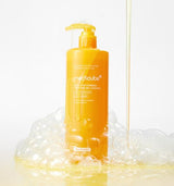 ProtoClinical k-beauty tall golden beauty product silhouette with soft pale blue side accents on a light background.
