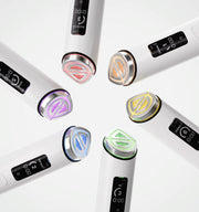 ProtoClinical k-beauty beauty product packaging in blue and beige tones on a light background.