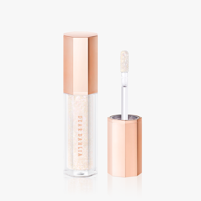 ProtoClinical k-beauty [DEAR DAHLIA] Paradise Shine Eye Sequins 4g #09 Angel Tears beauty close-up with a centered rounded form, soft peach tones, and a pale blue and white background