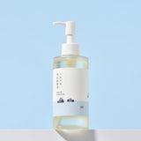 ProtoClinical k-beauty ROUND LAB 1025 DOKDO CLEANSING OIL 200mL single cleansing oil bottle on a light background