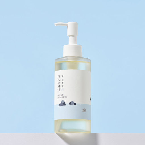 ProtoClinical k-beauty ROUND LAB 1025 DOKDO CLEANSING OIL 200mL single cleansing oil bottle on a light background
