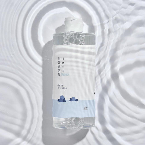 ProtoClinical k-beauty ROUND LAB 1025 Dokdo Cleansing Water 400mL single cleansing water bottle on a light background