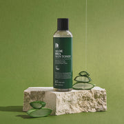 ProtoClinical k-beauty Benton Aloe BHA Skin Toner 200ml single upright dark green toner bottle centered on a pale green background