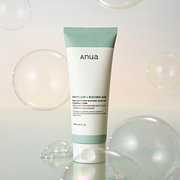 ProtoClinical k-beauty Anua HEARTLEAF SUCCINIC MOISTURE CLEANSING FOAM 150ml single upright green cleansing foam package centered on a light background with soft peach side accents.