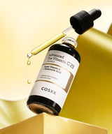 ProtoClinical k-beauty COSRX The Vitamin C 23 Serum 20ml single centered serum bottle with a dark cap on a pale yellow and cream background