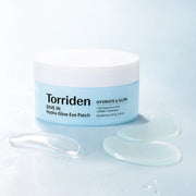 Torriden DIVE IN Hydra-Glow Eye Patch jar with aqua hydrogel patches and spatula