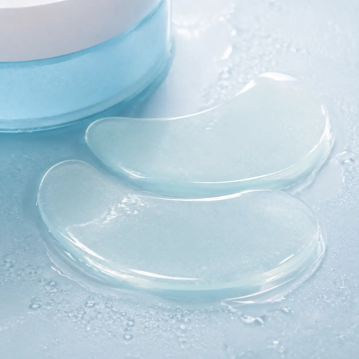Macro texture of translucent aqua Torriden hydrogel eye patches