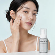 Applying VT Mint Micro Bubble Serum foam to the cheek